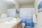 Enjoy our second full bathroom with a bathtub and shower combination, along with plenty of fresh towels and toiletries provided for your convenience.